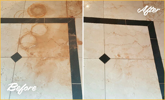 Before and After Picture of a Prince George Hard Surface Restoration Service on a Marble Floor to Eliminate Rust Stains